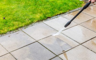 Detail of cleaning terrace with high-pressure water blaster, cleaning dirty paving stones Detail of cleaning terrace with high-pressure water blaster, cleaning dirty paving stones